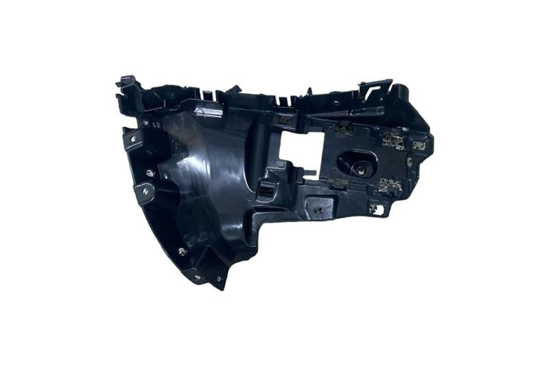 Rear Bumper Bracket LH(L663) with reference OE replacement number LR129801. Bodyshell - Doors - Locks - Moldings catalog part. Land Rover fitment: Defender L663 (2020 >), models.